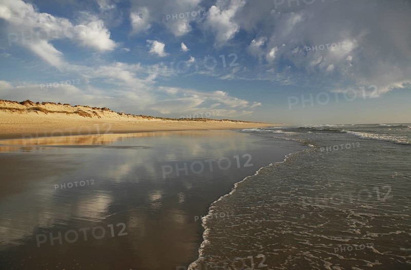 Beach and clouds in the evening light