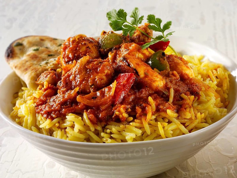 Chicken Jalfrezie Indian curry with pilau rice and naan bread