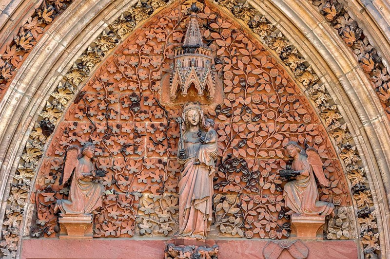 The Virgin Mary with angels in the tympanum of the portal of the Gothic St. Elizabeth's Church