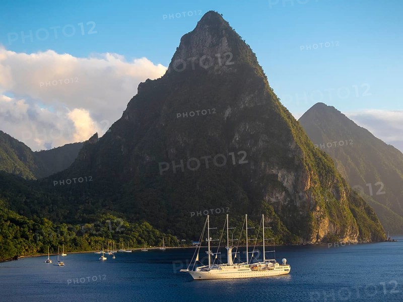 Sailing cruise ship Wind Star of Windstar Cruises in front of the volcanoes Gros Piton and Petit Piton