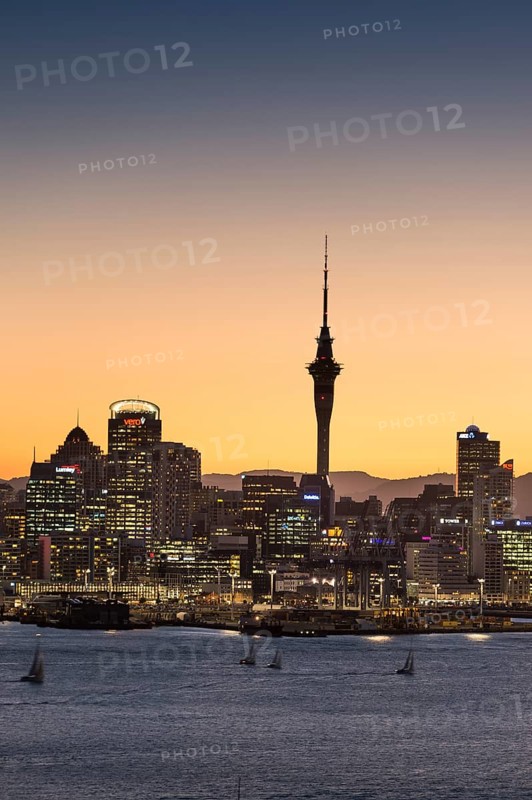 Skyline of Auckland with the Sky Tower at dusk