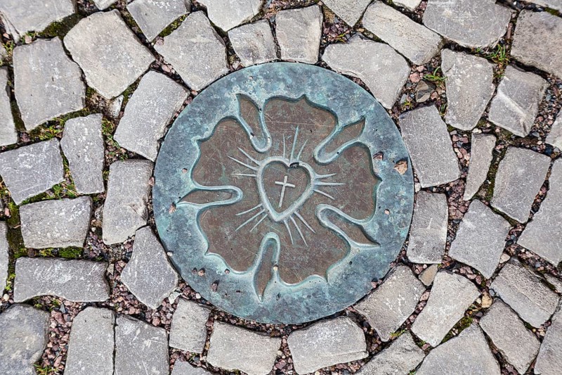 Luther Rose in the pavement