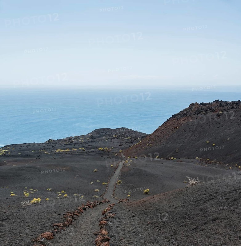 Hiking trail through a lava landscape