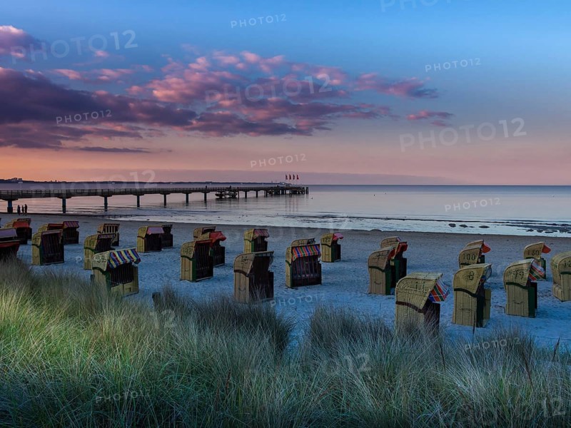 Beach chairs on the beach at dusk