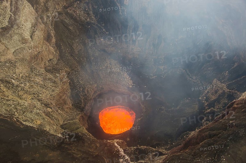 Glowing lava lake in the caldera of the Ambrym volcano