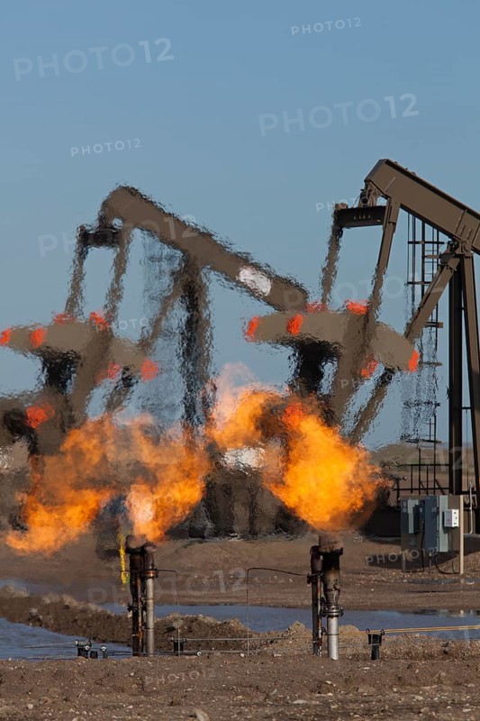 Natural gas is flared off as oil is pumped in the Bakken shale formation