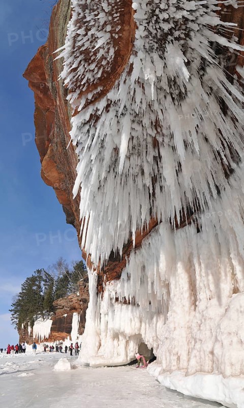 Icicles hanging from red sandstone along the shore of Lake Superior