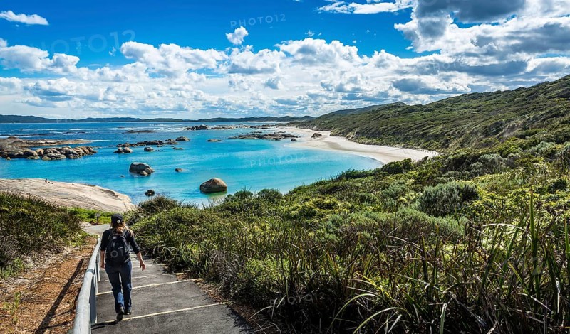 Woman walking down to Greens Pool in William Bay National Park