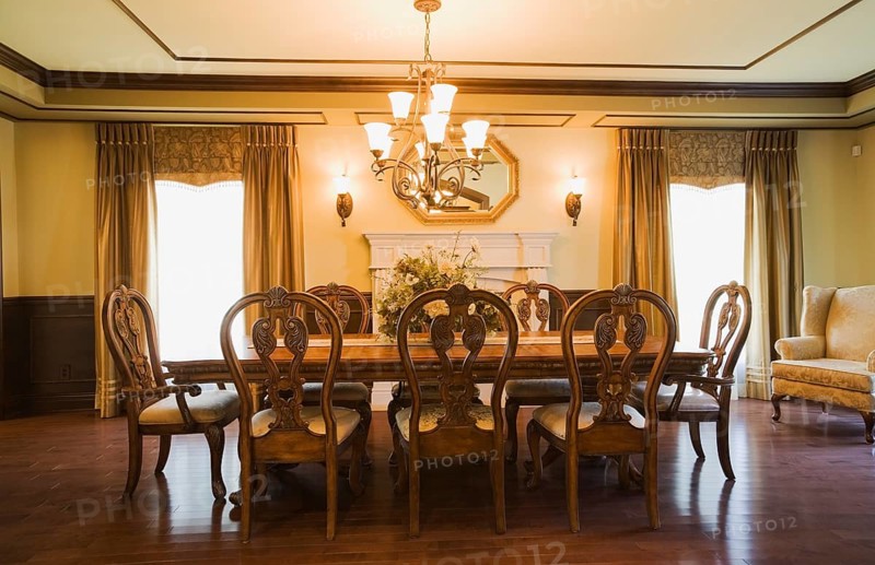Luxurious dining room with a wooden table and chairs