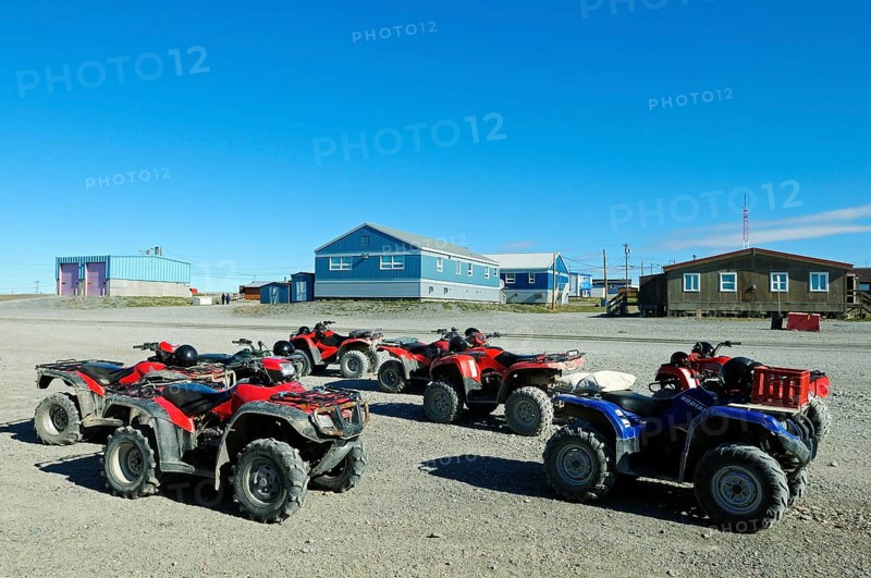 Car park with several quad bikes