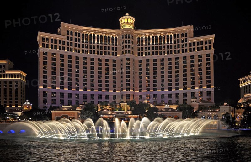 Bellagio Hotel and Casino with dancing water fountain show at night