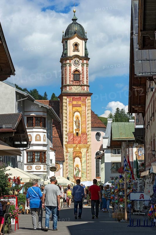 Bell tower of the parish church of St. Peter and Paul with Luftlmalerei