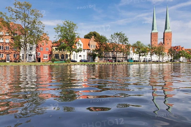 Cathedral reflected in Stadttrave river or Trave River