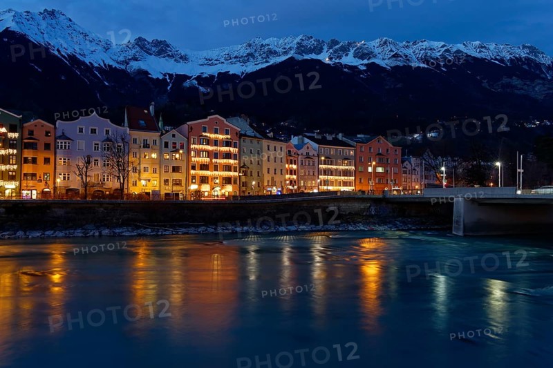 Buildings on the Inn River at dusk