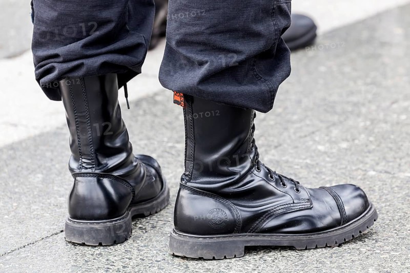 Member of a right-wing Hungarian party wearing combat boots