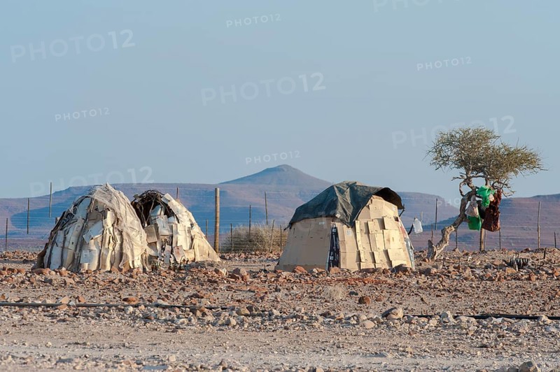 Traditional huts built from cardboard