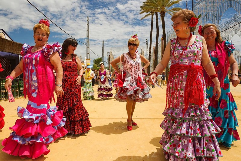 Women wearing gypsy dresses at the Feria del Caballo