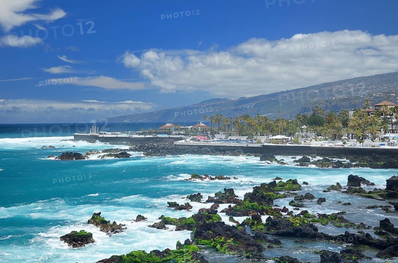 Surf at the city shore with the bathing landscape of Lago Martianez by the architect Cesar Manrique