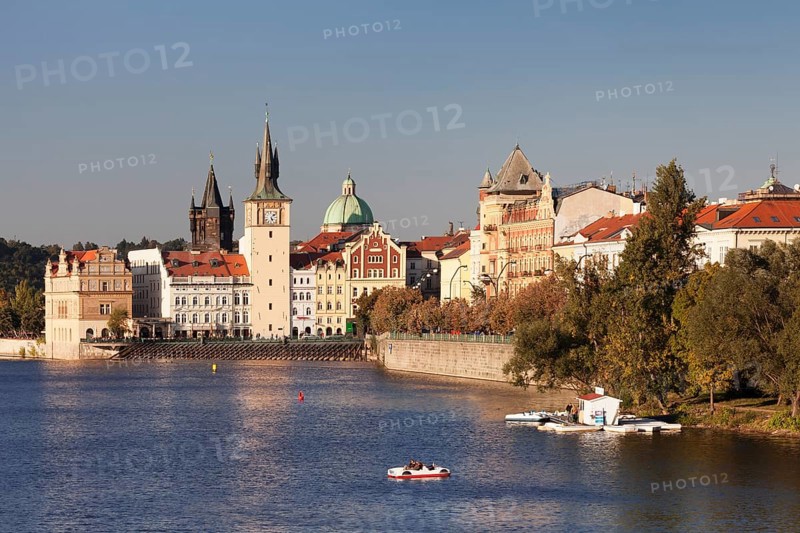 View over the Vltava River to the Bedrich Smetana Museum and the Old Town Bridge Tower