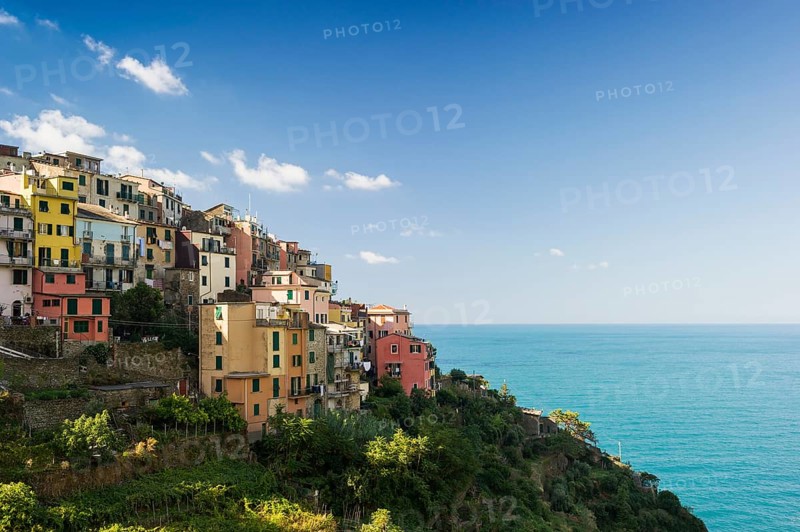 Village with colorful houses by the sea