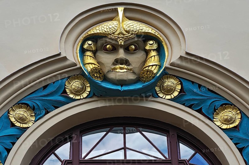 Decorative element above a window