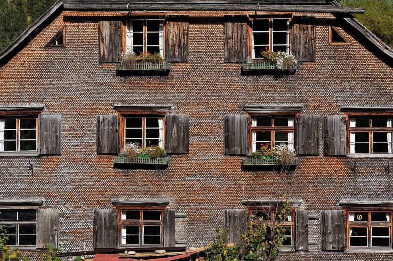 200 year old farmhouse with a shingled facade