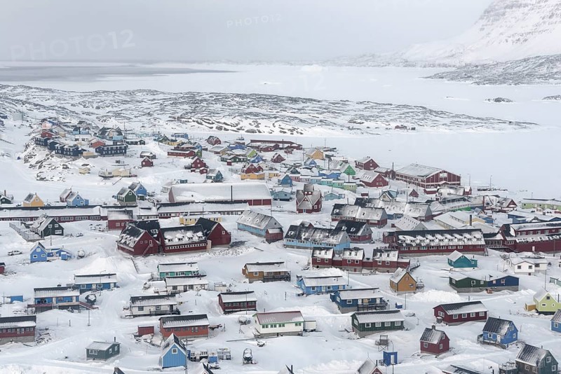 View in winter to the colourful houses of Qeqertarsuaq