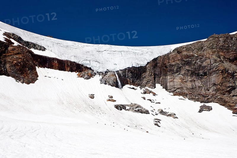 Snow-covered mountainside on Schwarzwandscharte Mountain