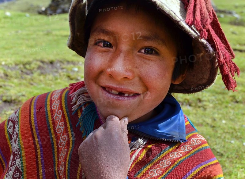 Young boy wearing traditional costume