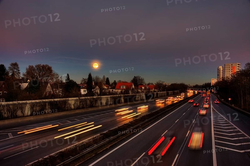 A96 motorway at dusk with light trails of moving cars