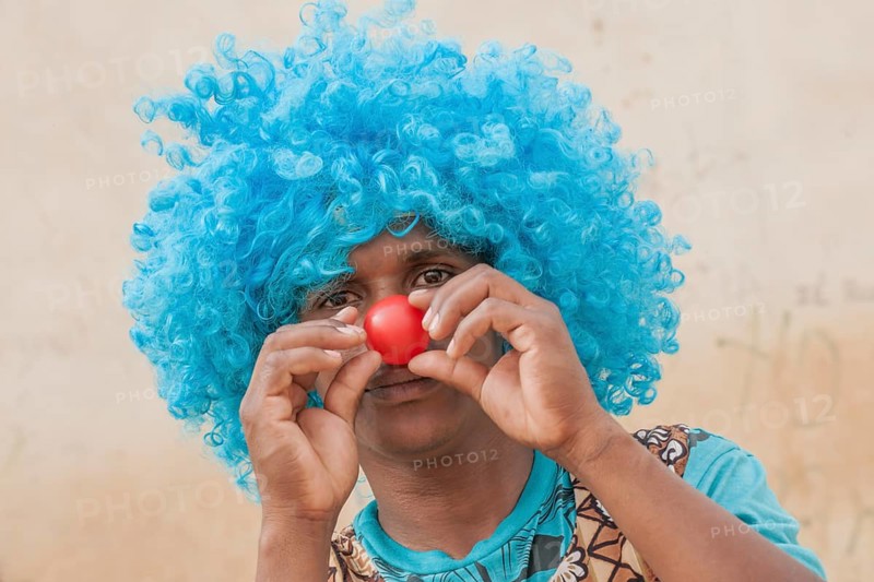 Member of a carnival club in the slums of Ribeira Bote