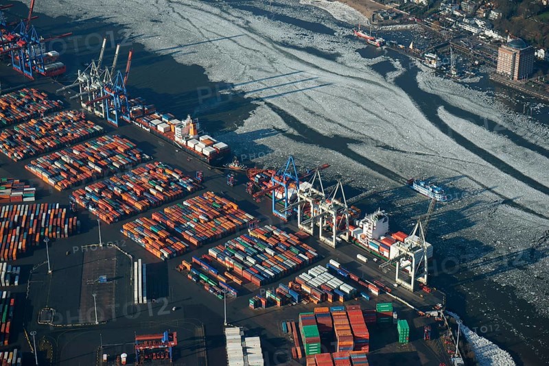 HHLA Container Terminal Burchardkai in winter with ice on the Elbe