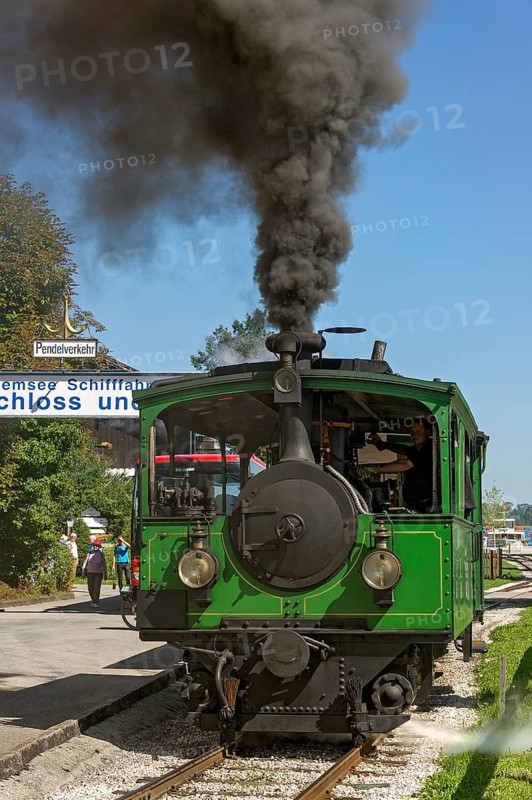 Steam locomotive with black smoke