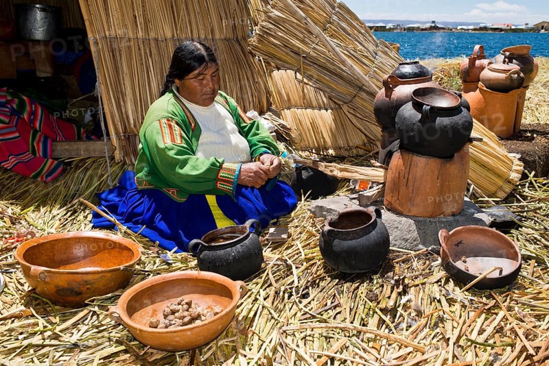 An elderly woman of the Uro Indians wearing typical attire