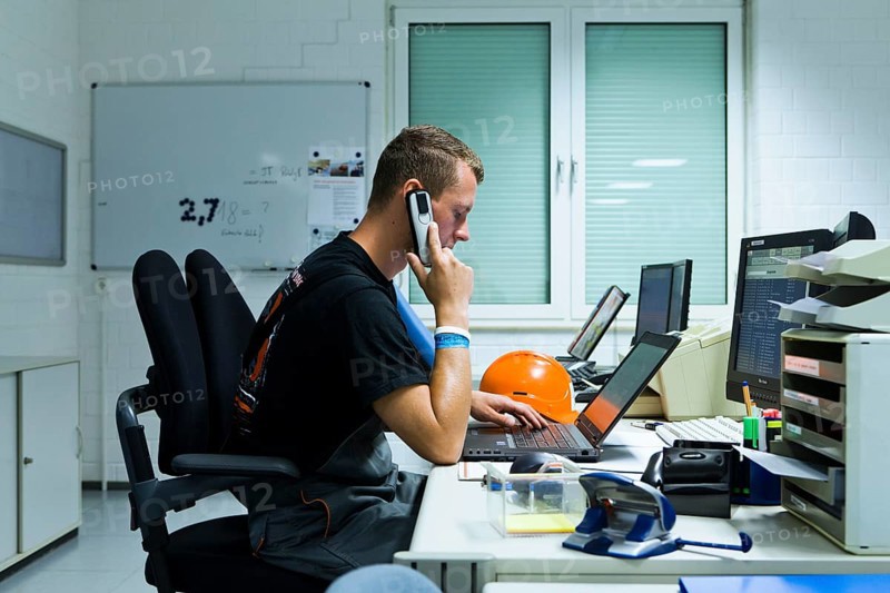 Electrician performing maintenance work on the substation premises of Transmission Control Center