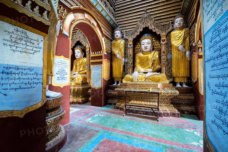 Seated and standing Buddha statues