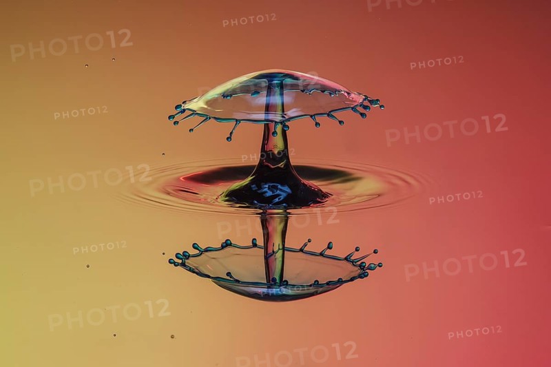 Three drops collide