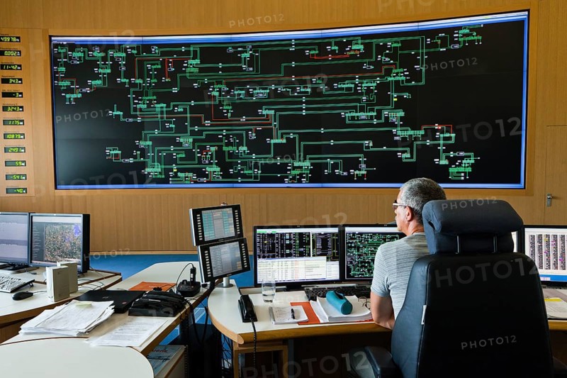 Engineer sitting at his work station in the Transmission Control Center