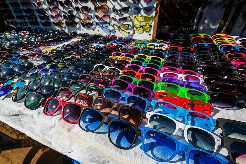Colourful sunglasses for sale at the weekly flea market