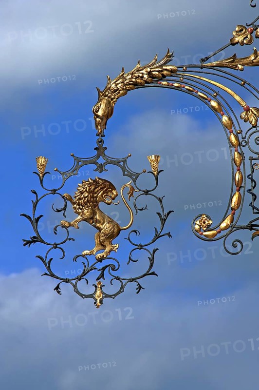 18th century hanging sign of the former 'Goldener Lowe' guesthouse