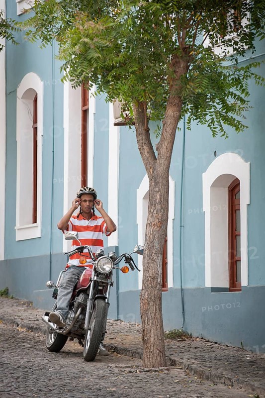 Man sitting on a motorcycle