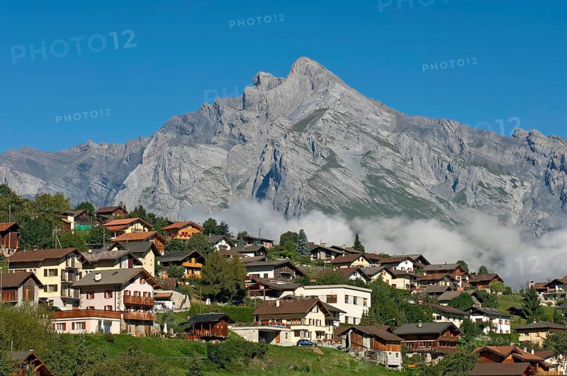 Valaisian village of Sornard in front of the summit of Haut de Cry Mountain