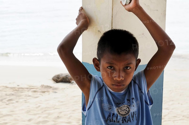 Kuna Indian boy in a Kuna Indian village