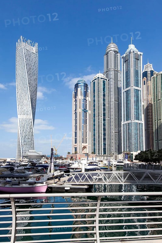 Cayan Tower and skyscrapers with marina