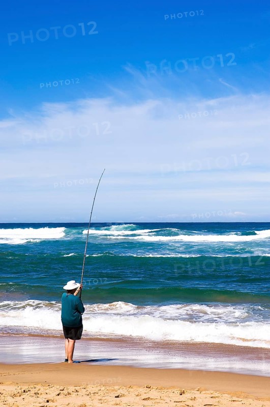Fisherman on the beach