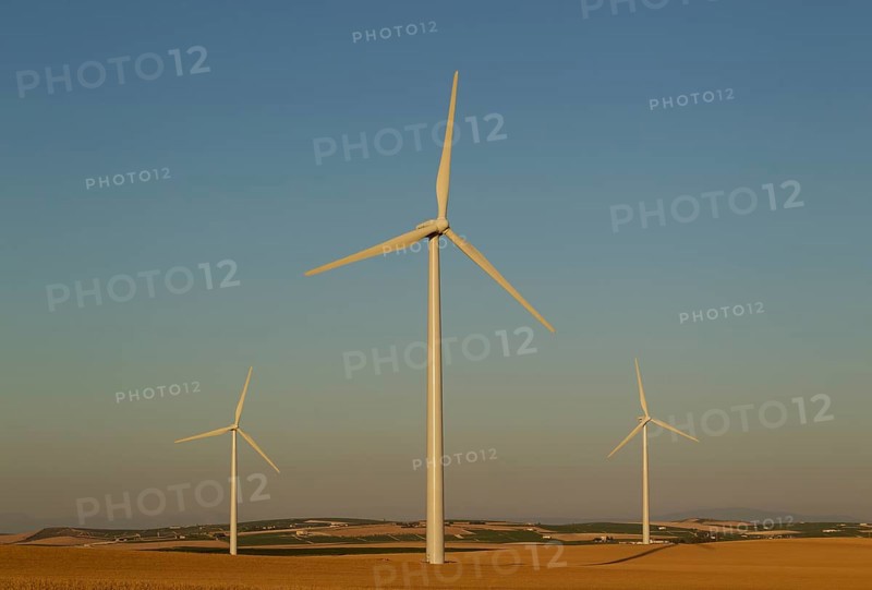 Windmills in the evening light on a wind farm near Sanlucar de Barrameda