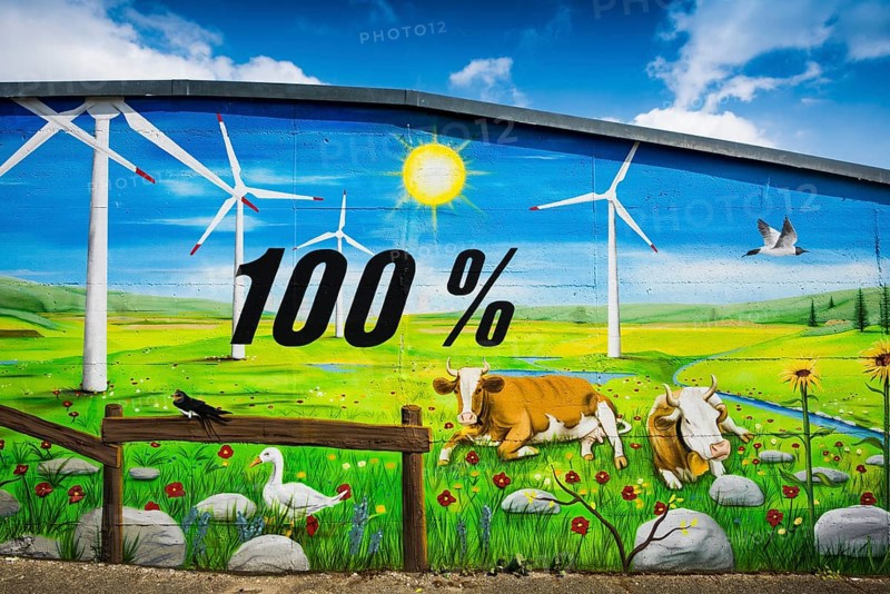 Wall of a house painted with a renewable energy theme
