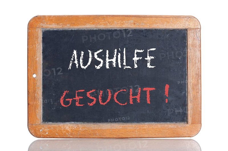Old chalkboard with the words 'AUSHILFE GESUCHT'