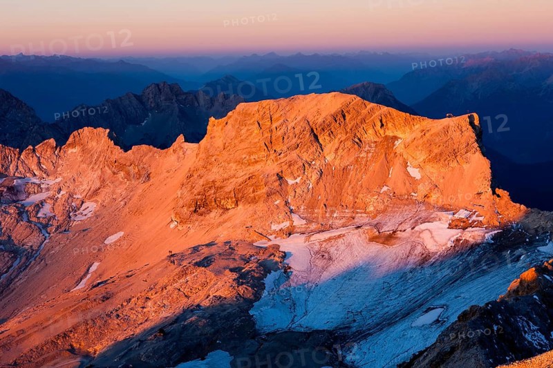 Sunrise view from Mt Zugspitze to Mt Schneefernerkopf