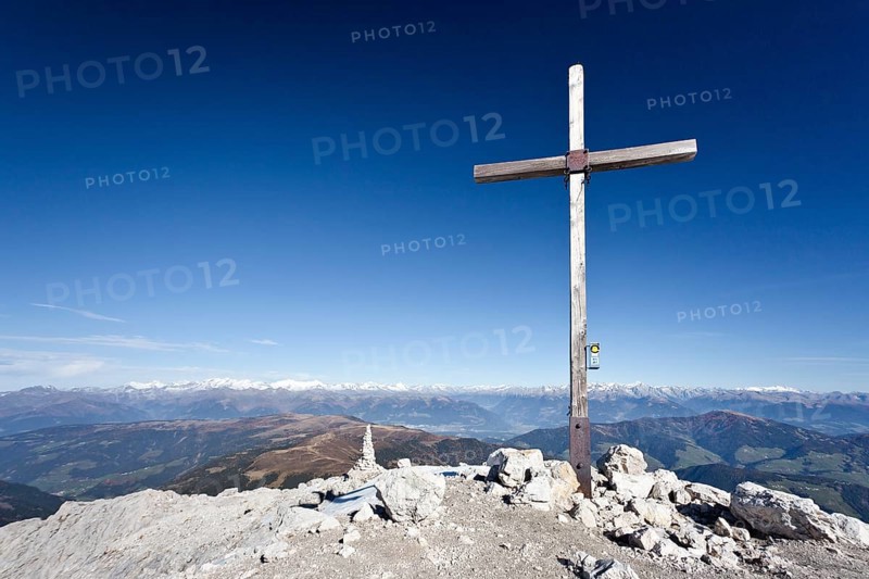 Summit cross on Peitlerkofel Mountain in Puez-Geisler Nature Park